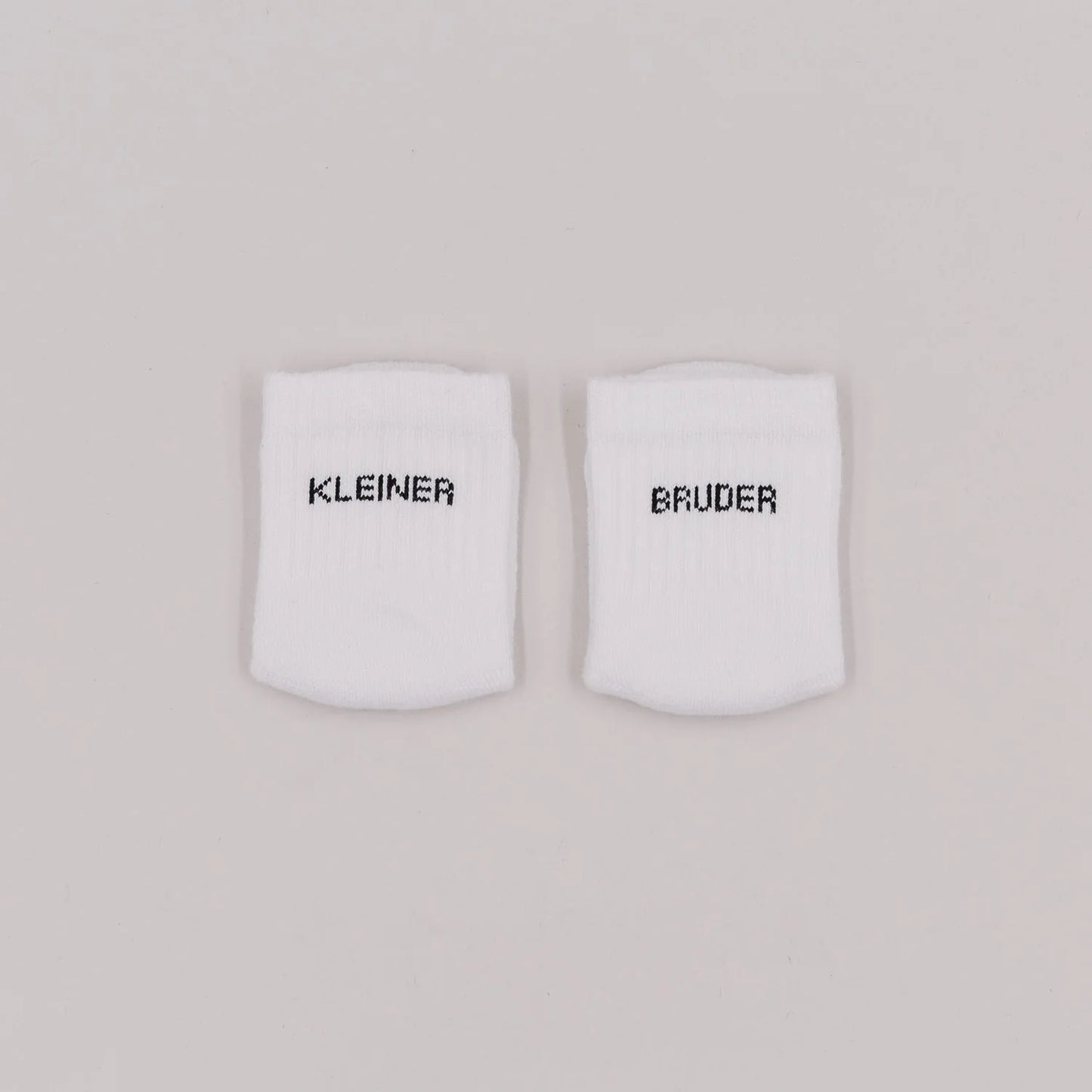 Eulenschnitt Baby Socken KLEINER BRUDER